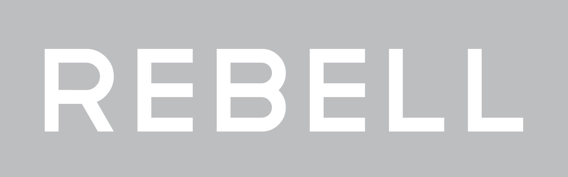 Texten Rebell på grå bakgrund