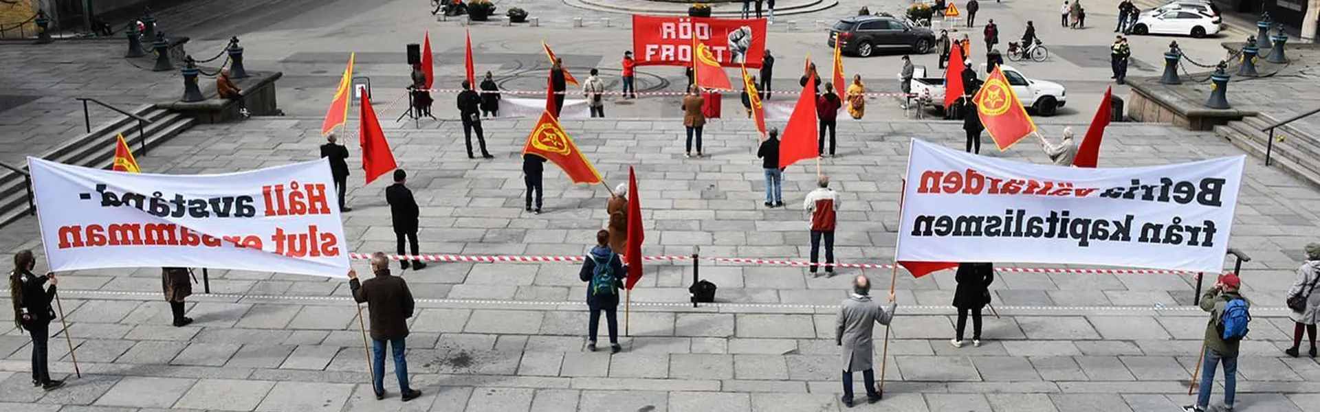 Bild p&aring; demonstranter vid Kommunisterna f&ouml;rsta maj firande 2021